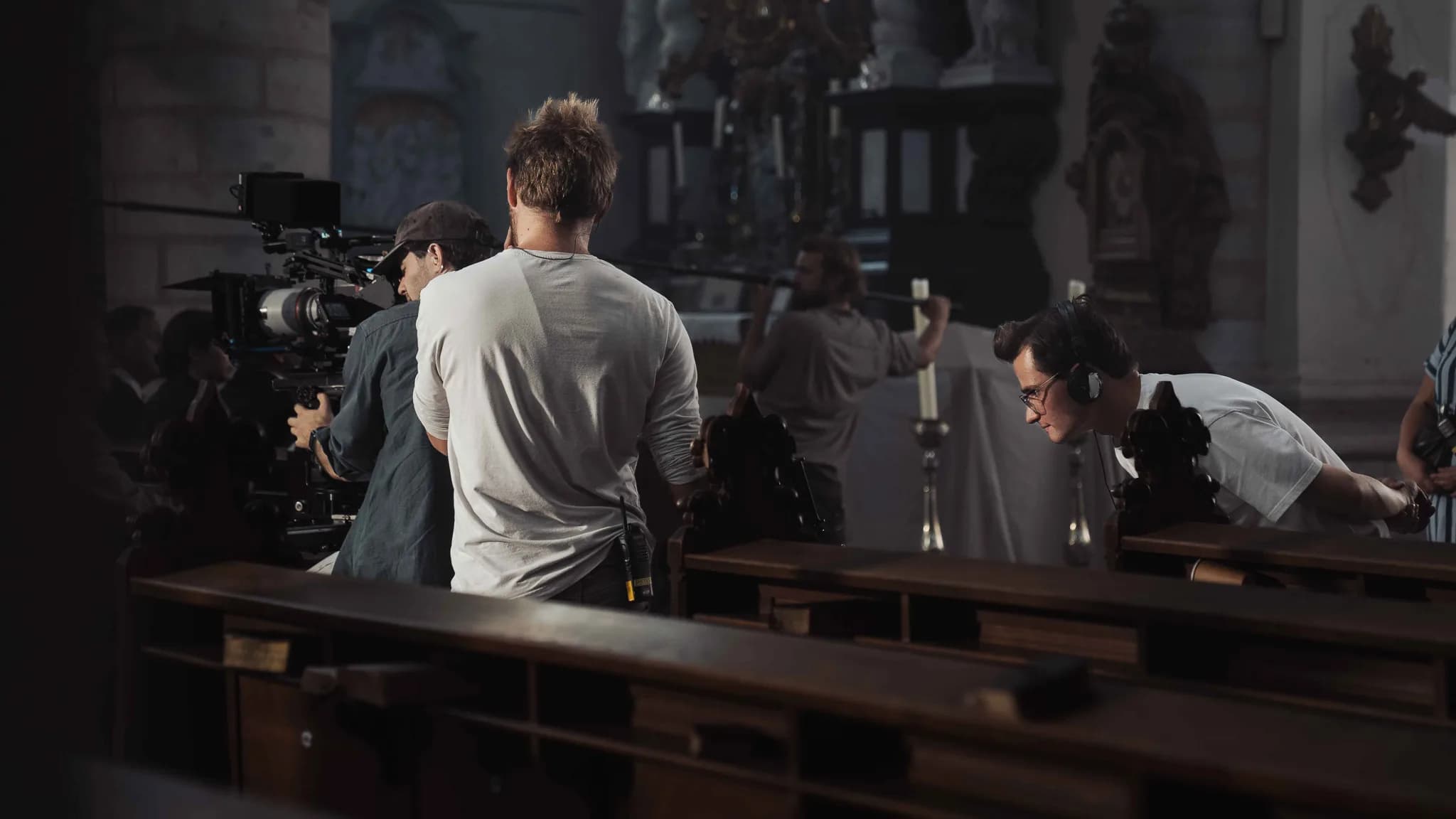 Julien Hayet-Kerknawi directing a scene for The Last Front inside a Belgian church