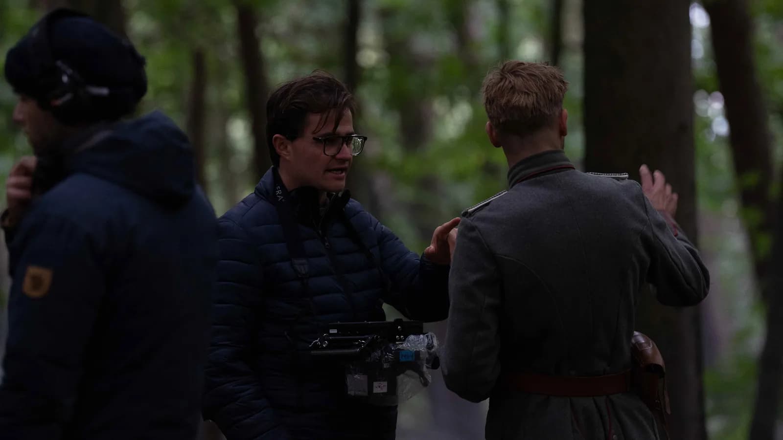 Julien Hayet-Kerknawi directing a forest scene with a costumed actor